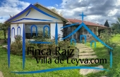 zona verde frente a la entrada